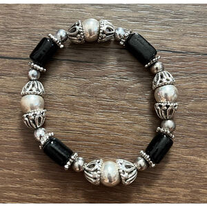 Silver tone and black bead stretch bracelet